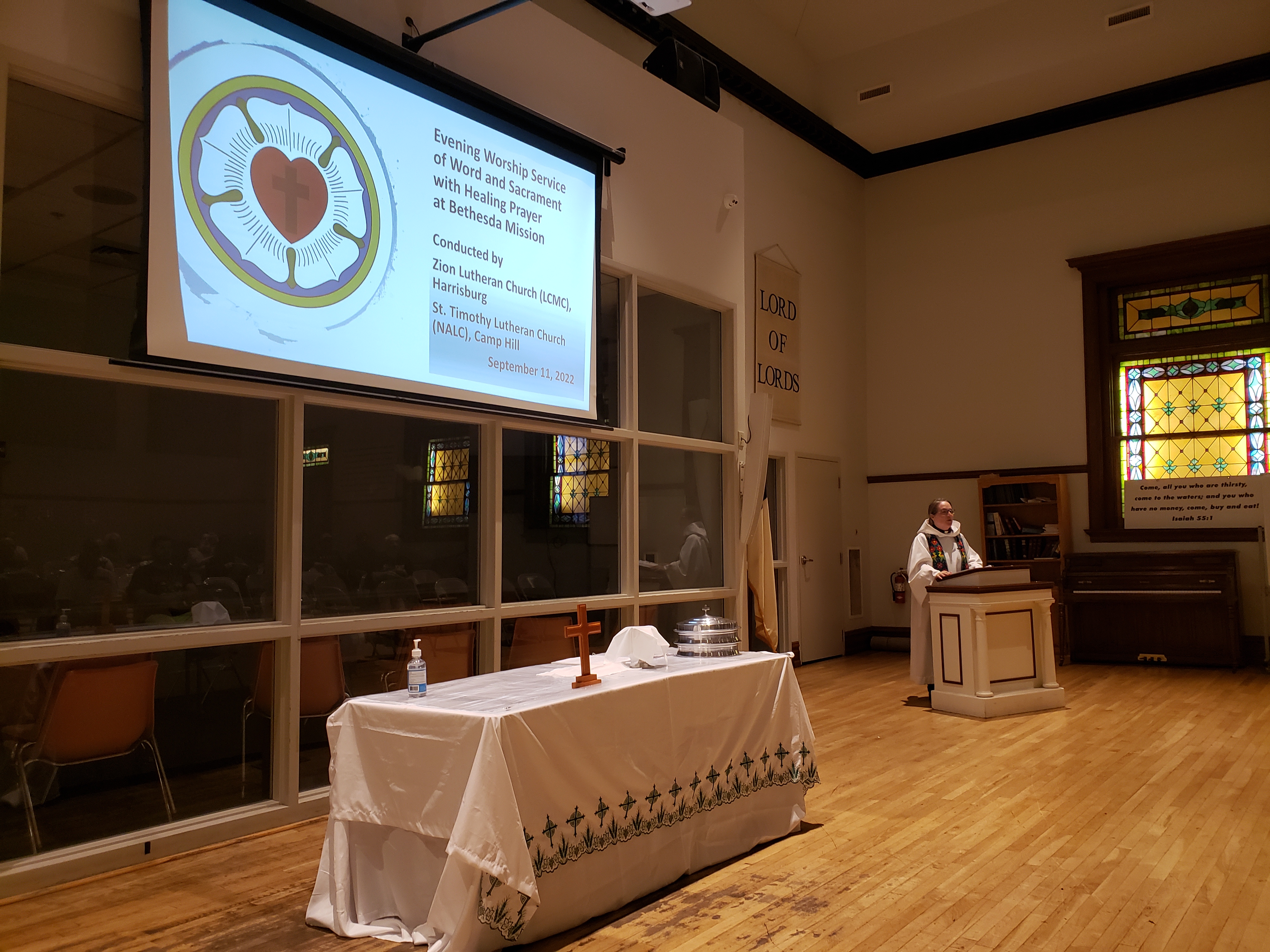 Pastor Karin Pejack Leading Worship at Bethesda Mission Mens Shelter